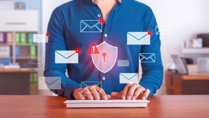 Businessman Managing Cybersecurity Threats with Antivirus Protection in Email System